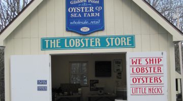 front of a shed offering lobsters
