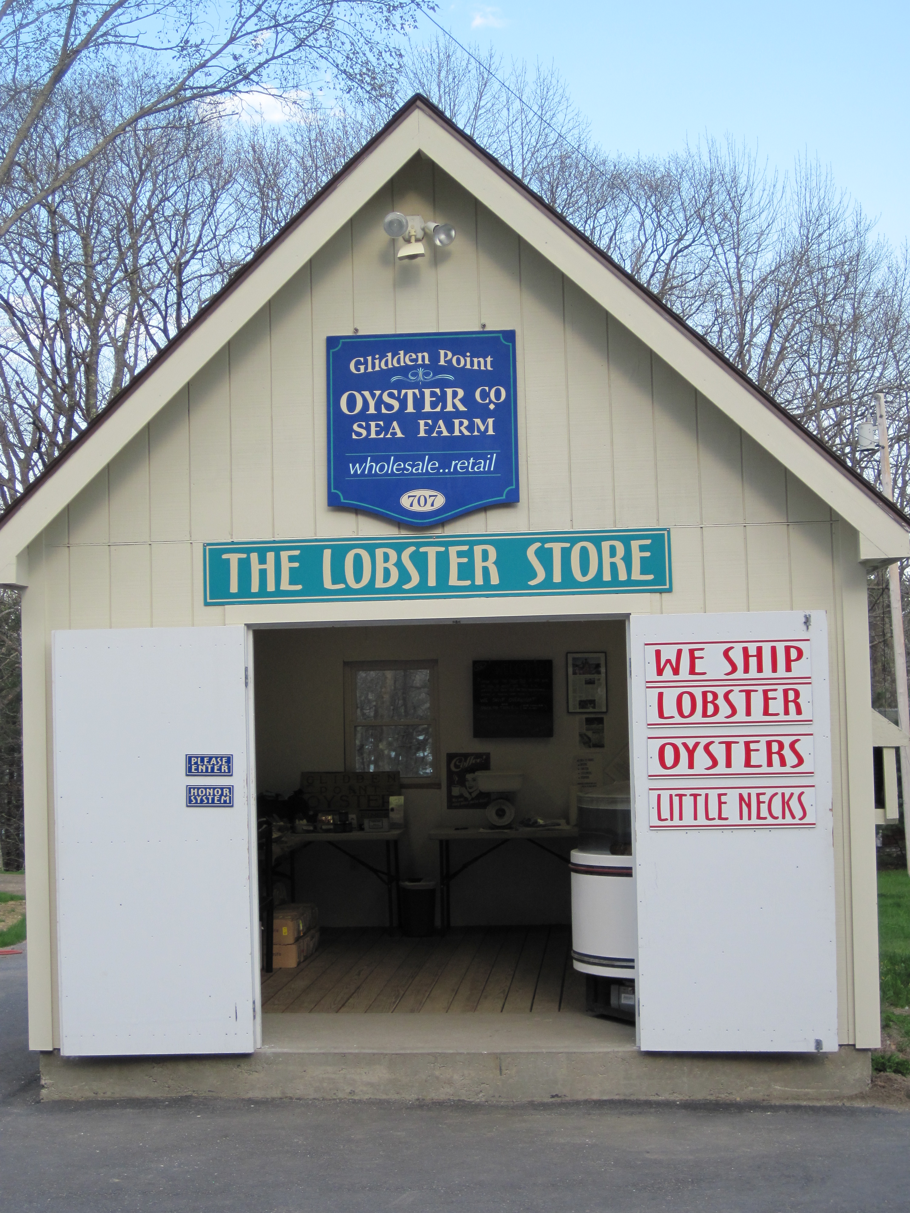 front of a shed offering lobsters