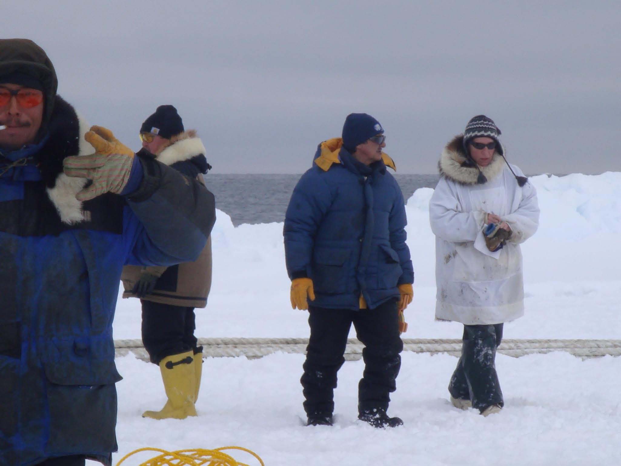 Alaska Sea Grant agent Paula Cullenberg with Native Alaskan hunters on North Slope G. Sheffield photo.