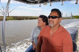 two people aboard a boat