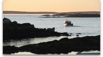 Photo of a lobster boat on the Maine Coast