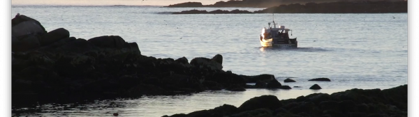 Photo of a lobster boat on the Maine Coast