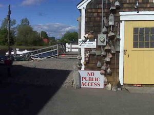 sign in front of a building reading 'No Public Access'