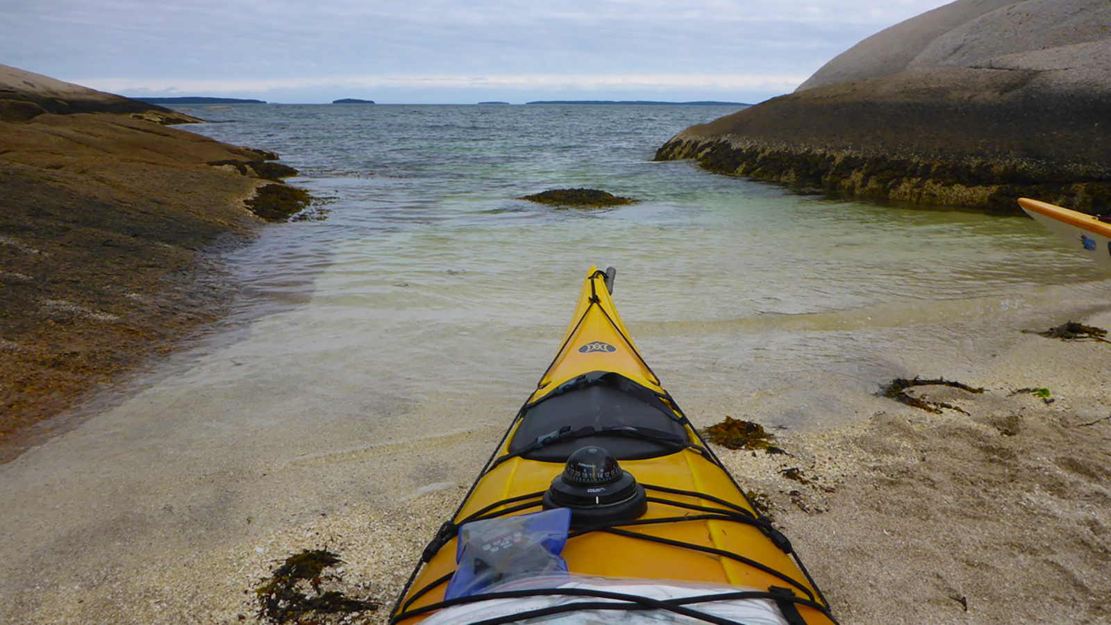 bow of a kayak pointed at the water