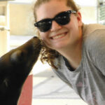 Alesha Gregoire with a seal