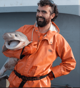 Nathan Willse holding a shark