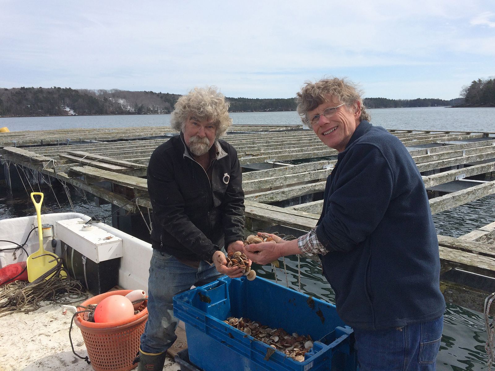 smokey and chris near a bin of shellfish