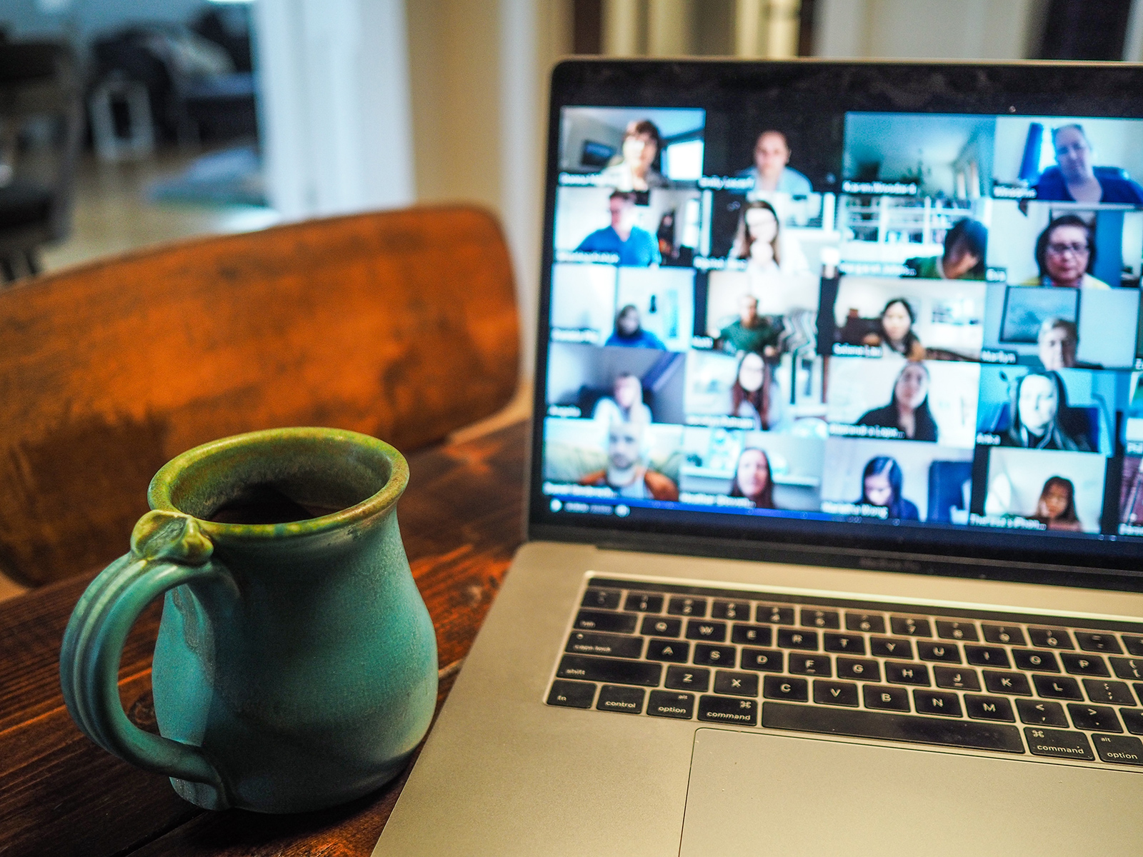 stock image of a computer running a virtual meeting