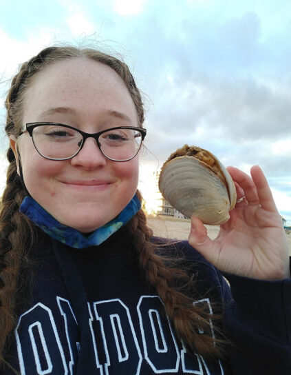 Jessica Kemp holding a clam