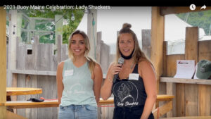 Still from the Lady Shuckers youtube video from the Buoy Maine celebration 2021. Click to watch video.