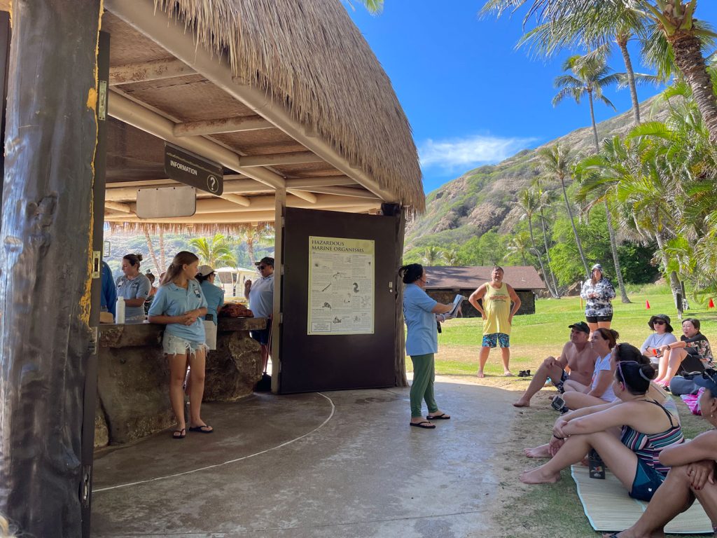 Brook Cleveland from Hawaii Sea Grant's Education Department shares information about local reef fish with the general public.