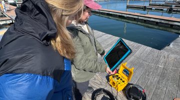 2 people look at alternative lobster gear options.